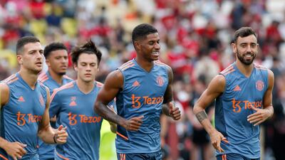 Left to right: Diogo Dalot, Marcus Rashford, and Bruno Fernandes during training. EPA