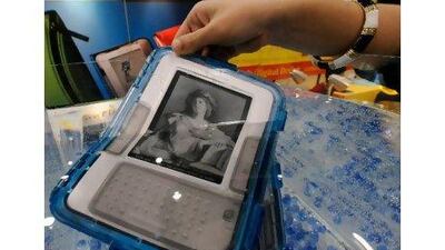 Not even drowning will help with an e-book addiction to sentimental literature. Ethan Miller / Getty Images / AFP