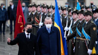 Ukrainian President Volodymyr Zelensky, left, and his Turkish counterpart, Recep Tayyip Erdogan, review the Guard of Honour during their meeting at the Mariinsky Palace in Kiev last week. EPA