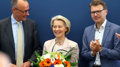 European Commission President Ursula von der Leyen, with Christian Democratic Union leader Friedrich Merz, left, and CDU member Daniel Caspary in Berlin on Monday. Reuters