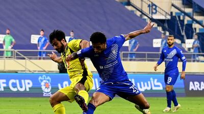 Kalba defender Sultan Al Suwaidi, left, during the Arabian Gulf Cup semi-final first leg at the Al Maktoum Stadium on Tuesday, February 9. Courtesy PLC