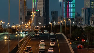 Buildings lit up in the colours of Kuwait.