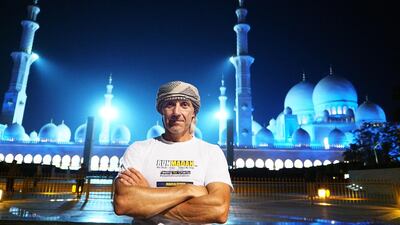 Max Calderan at Sheikh Zayed Grand Mosque in Abu Dhabi before the start of his 150-km run. Delores Johnson / The National