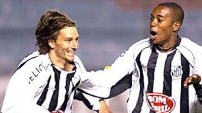 Elano, left, and Robinho celebrate a goal when the Manchester City pair played for the Brazilian giants Santos.