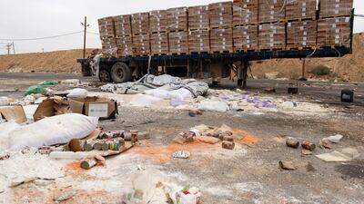 Damaged packages of humanitarian aid are scattered on the ground near Al Karara crossing (also known as Kissufim) on the Israeli side of the Gaza border. Getty images