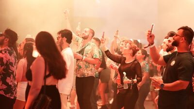 Fans enjoy the music from the Resistance Stage. Pawan Singh / The National