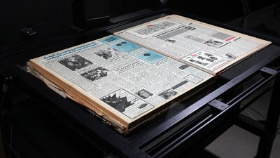 Scanning old newspapers