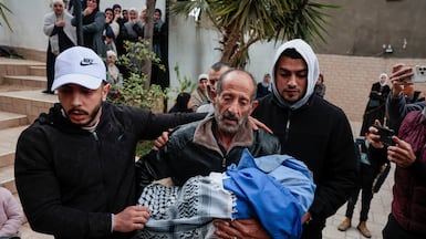 The body of one of the children is carried during the funeral in Tammun, in the occupied West Bank. Reuters