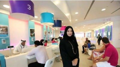 Hala Badri is a mother of three children under the age of 10. She works long hours as executive vice president of brand and communications at du, but credits her success to her supportive mentors. Pawan Singh / The National