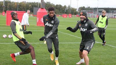 Aaron Wan-Bissaka, Marcus Rashford and Luke Shaw. Getty