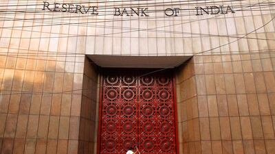 A worker cleans the stairs of the Reserve Bank of India (RBI) building in Kolkata. REUTERS/Rupak De Chowdhuri