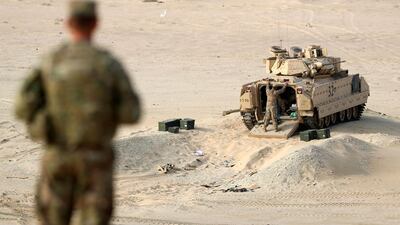 Troops were closely observed by their commanders during the training exercise. Chris Whiteoak / The National