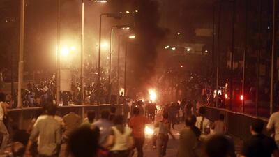 Egyptian Christians clash with soldiers and riot police during a protest against an attack on a church in southern Egypt, in Cairo October 9, 2011. Nineteen people were killed in Cairo on Sunday when Christians, some carrying crosses and pictures of Jesus???