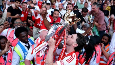 Declan Rice of Arsenal kisses the Premier League trophy at Selhurst Park on Sunday. Getty Images