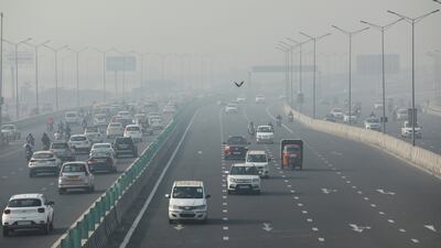 Vehicles are seen shrouded in smog on a highway in New Delhi. Reuters
