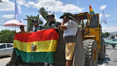 People march calling for the pacification of the country, in Cochabamba, Bolivia. EPA