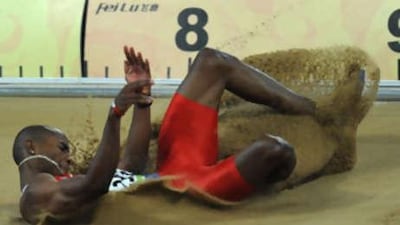 Panama's Irving Saladino Aranda competes during the men's long jump final at the National Stadium.