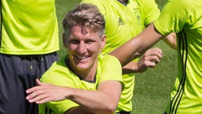 Bastian Schweinsteiger, center, attends the last training session of the German national football team at their base camp in Evian-Les-Bains, France, Wednesday, July 6, 2016. Germany will face France in a Euro 2016 semifinal soccer match in Marseille on Thursday, July 7, 2016 (AP Photo/Cirian Fahey)