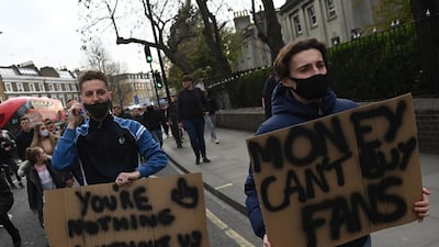 Chelsea fans protesting against the planned European Super League. EPA