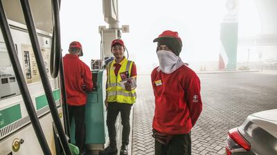 Foggy ENOC petrol station along Hessa Road. Victor Besa / The National.
