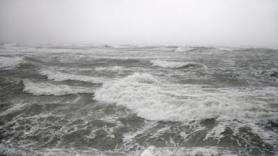Waves are seen ahead of Tropical Storm Nicholas in the Gulf of Mexico in Corpus Christi, Texas. Nearly 44% of the area's oil supply has been cut off. AP