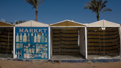 Empty market stalls are seen in the resort town of Naama Bay.
