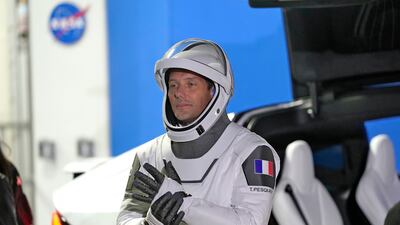 Thomas Pesquet of France talks to family and friends before a launch attempt at the Kennedy Space Centre in April 2021 in Cape Canaveral, Florida. AP Photo