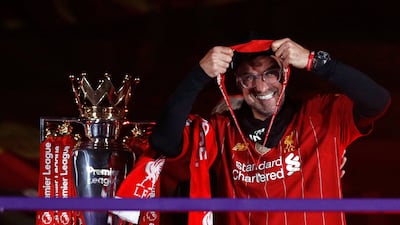 Liverpool manager Jurgen Klopp with his winners medal during a trophy presentation at Anfield.