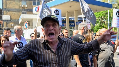 Protesters rally in support of a bank customer who took staff hostage in Beirut, in a bid to access his savings, amid Lebanon's economic crisis. EPA