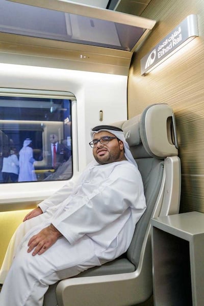 Hamad Mansour Albloushi takes in the view from Seat 1, Coach 1 on the first passenger service. Photo: Etihad Rail