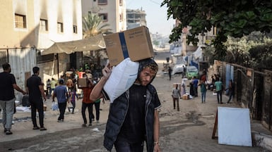 The World Food Programme has cut its aid deliveries to Gaza due to funding shortages. AFP