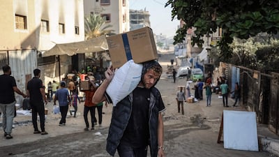 The World Food Programme has cut its aid deliveries to Gaza due to funding shortages. AFP