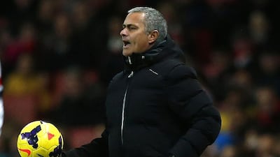 Jose Mourinho and Chelsea sit two points back of Arsenal and Liverpool in the Premier League table. Andrew Winning / Reuters