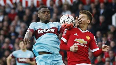 Manchester United’s Guillermo Varela in action with West Ham’s Emmanuel Emenike. Reuters / Andrew Yates