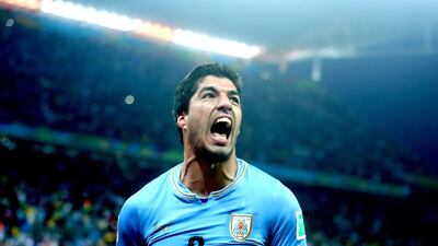 Luis Suarez is still serving a ban from biting Giorgio Chiellini at the 2014 World Cup as the 2015 Copa America begins. Diego Azubel / EPA