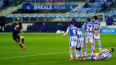 Barcelona's Lionel Messi takes a free-kick. Reuters