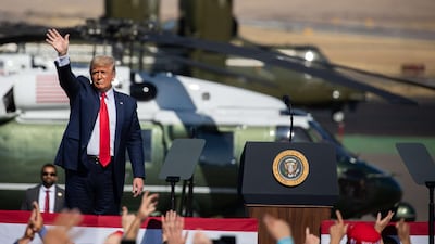PRESCOTT, AZ - OCTOBER 19: U.S. President Donald Trump waves to the crowd before departing at a Make America Great Again campaign rally on October 19, 2020 in Prescott, Arizona. With almost two weeks to go before the November election, President Trump is back on the campaign trail with multiple daily events as he continues to campaign against Democratic presidential nominee Joe Biden. Caitlin O'Hara/Getty Images/AFP == FOR NEWSPAPERS, INTERNET, TELCOS & TELEVISION USE ONLY ==