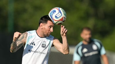 Lionel Messi heads the ball during training in Kansas City. AFP