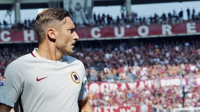Roma's Francesco Totti walks on the pitch during a Serie A soccer match between Roma and Torino at the Turin Olympic stadium, Italy, Sunday, Sept. 25, 2016. Alessandro Di Marco / AP