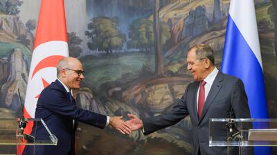 Russian Foreign Minister Sergey Lavrov, right, shakes hands with Tunisian counterpart Nabil Ammar after a meeting in Moscow on Tuesday. EPA