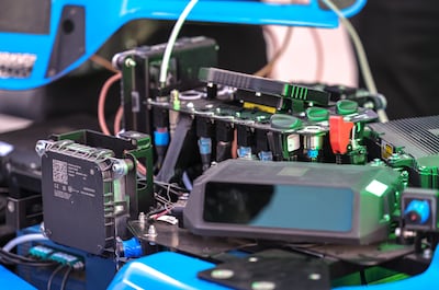 The autonomous cars use sensors and onboard computing systems to make decisions at top speed. Victor Besa / The National