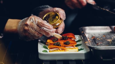 Caviar is added to roast duck slices. Getty Images
