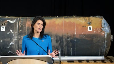 US Ambassador to the UN Nikki Haley speak in front of recovered segments of an Iranian rockets during a press briefing at Joint Base Anacostia-Bolling, Thursday, Dec. 14, 2017, in Washington. Haley says "undeniable" evidence proves Iran is violating international law by funneling missiles to Houthi rebels in Yemen. Cliff Owen / AP