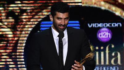 Bollywood actor Aditya Roy Kapoor receives the award for Best Performance in a Supporting Role. Jewel Samad / AFP