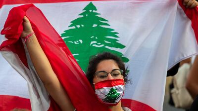 An anti-government protester shouts slogans. Major retailers in Lebanon last week said they will temporarily close in the wake of an increasingly volatile currency market and their inability to set prices while the local currency tumbles against the US dollar. AP