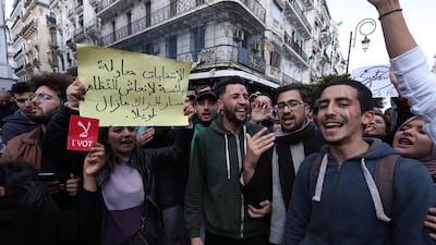 Algerians chant slogans during a protest rally in Algiers, Algeria. Thousands of people have taken to the streets in the capital Algiers calling for a mass boycott of the country's presidential elections, which is taking place on the day, and to voice against the five candidates running to replace ousted president Abdelaziz Bouteflika for being closely linked to the former regime. EPA