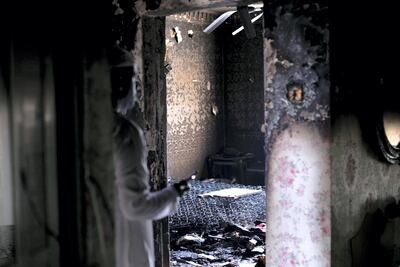 The children were at the home of their grandparents at the time of the fire. Reem Mohammed / The National