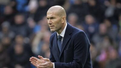 Real Madrid manager Zinedine Zidane encourages his side during their La Liga win over Sporting Gijon on Sunday. Emilio Naranjo / EPA / January 17, 2016