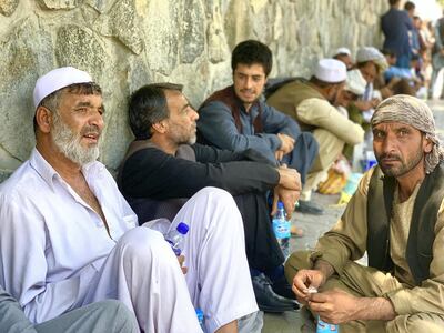 Mohammad Asif, 55, waits on the pavement outside the Emergency Hospital in Kabul for news of his only son who was injured in a Taliban attack on Monday morning. Photo by Hikmat Noori for The National