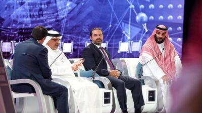 Saudi Crown Prince Mohammed bin Salman, right, Lebanese Prime Minister Saad Al Hariri, second right, and Bahrain Crown Prince Salman bin Hamad Al Khalifa, second left, attend the Future Investment Initiative conference. Dubai Media Office / Wam